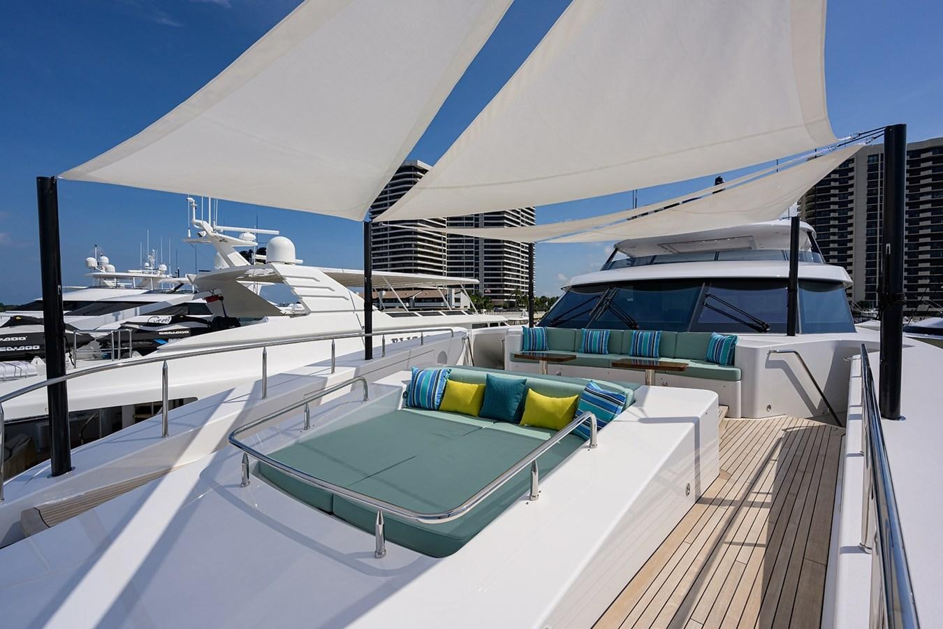 a pool with a lounge chair and a boat on it aboard MARSHA KAY Yacht for Sale