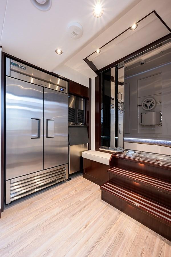 a room with a large glass door aboard MARSHA KAY Yacht for Sale