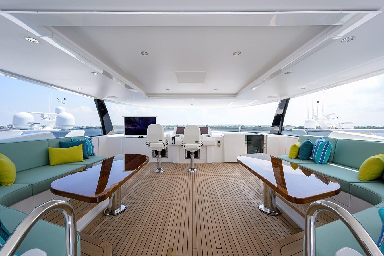 inside of a room with tables and chairs aboard MARSHA KAY Yacht for Sale