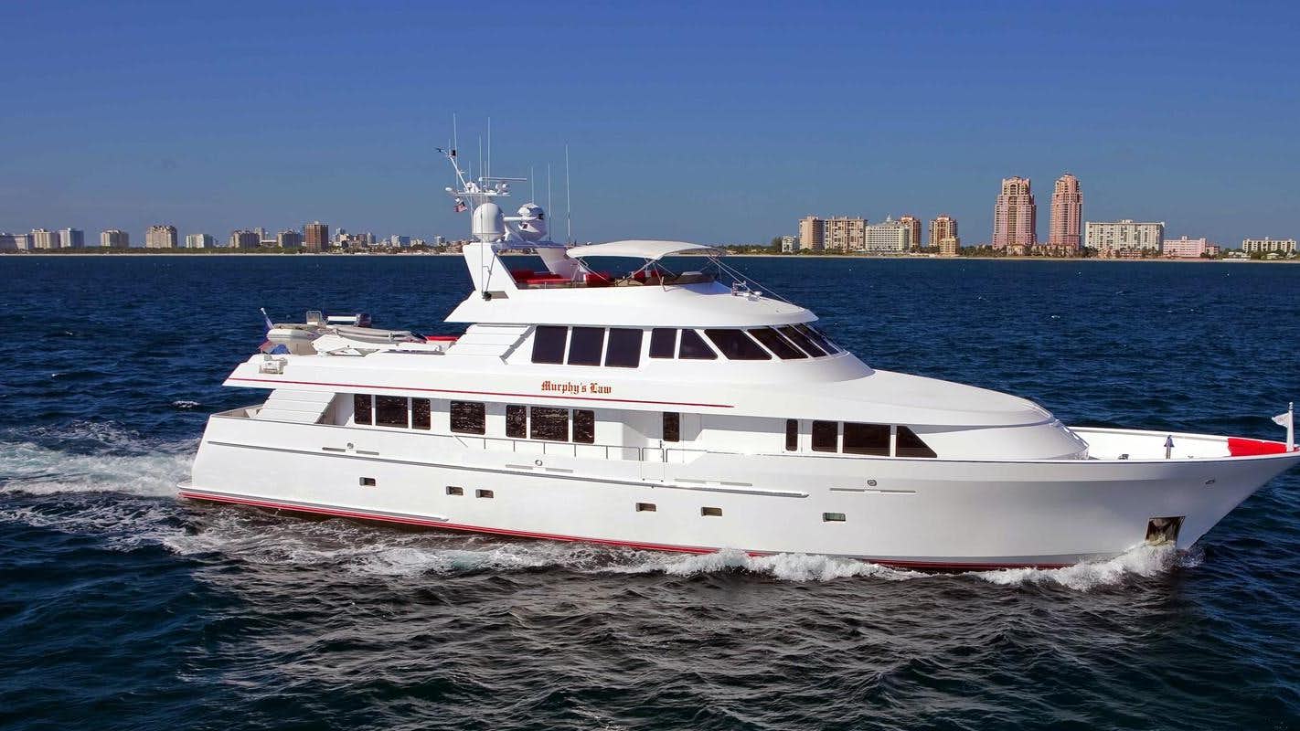 a white yacht on the water aboard MURPHY'S LAW Yacht for Sale