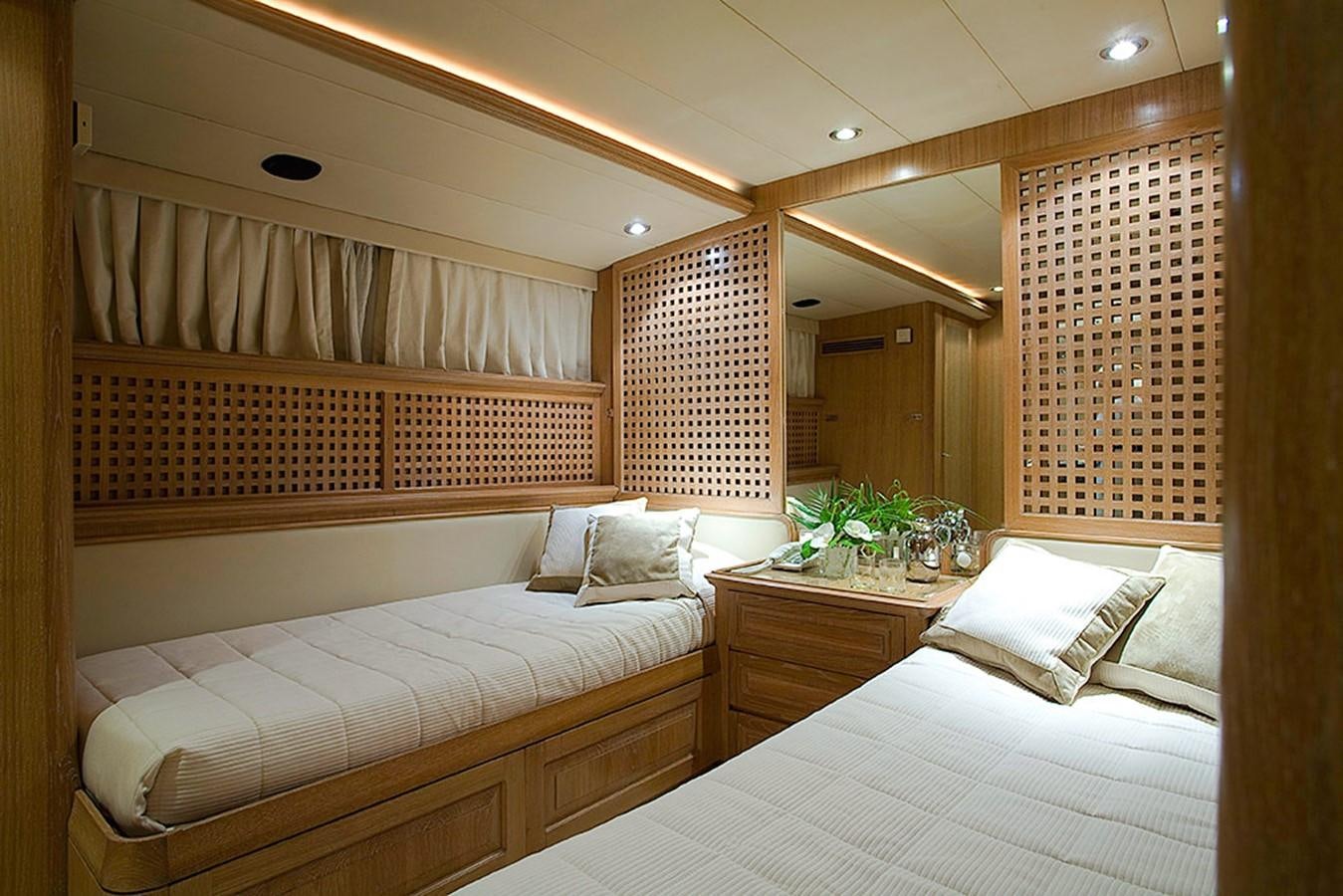 a room with two beds aboard ALTHEA Yacht for Sale