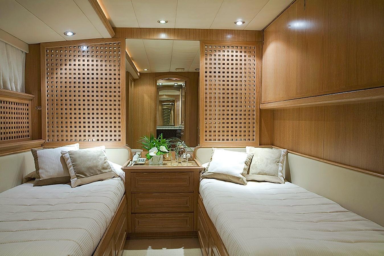 a room with two beds aboard ALTHEA Yacht for Sale