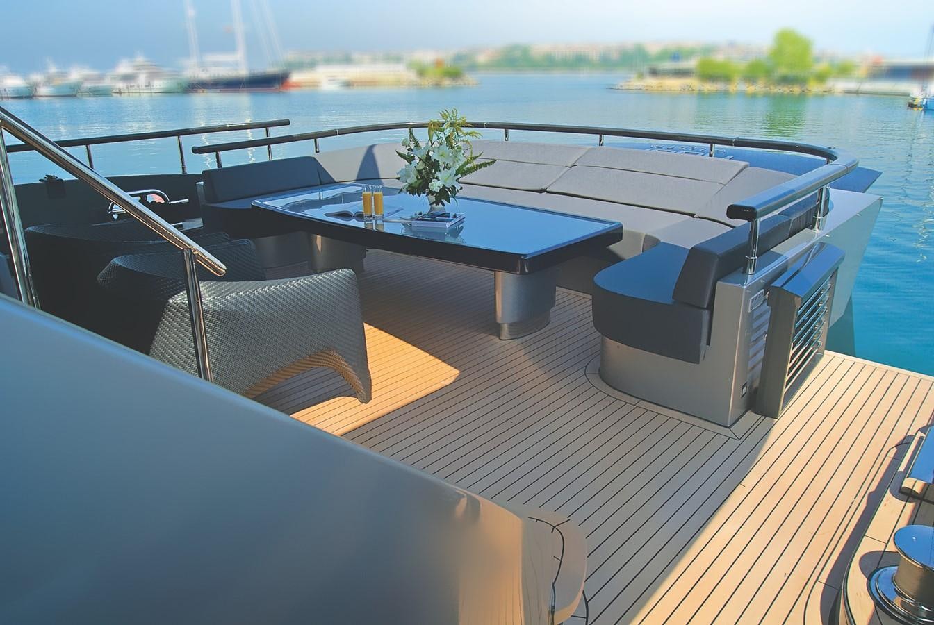 a table and chairs on a boat aboard RL NOOR Yacht for Sale