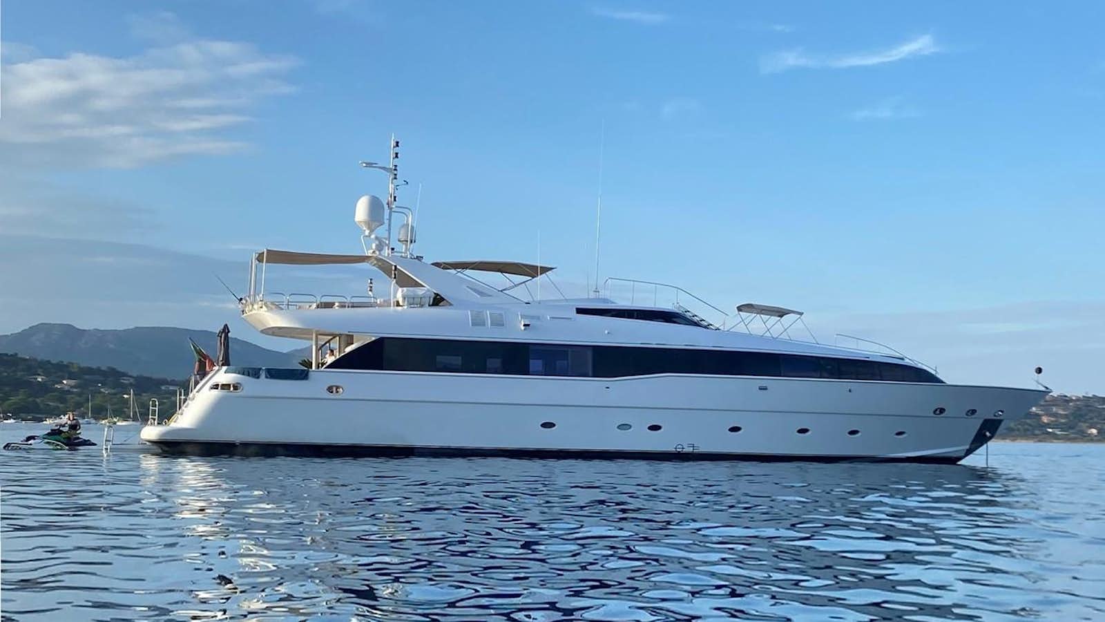 a white yacht in the water aboard PALM B Yacht for Sale