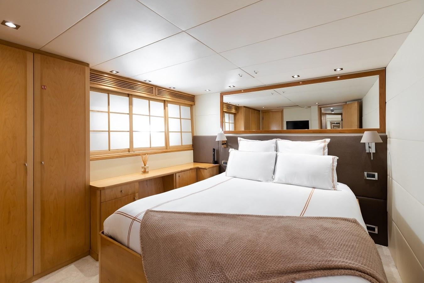 a room with two beds aboard PALM B Yacht for Sale