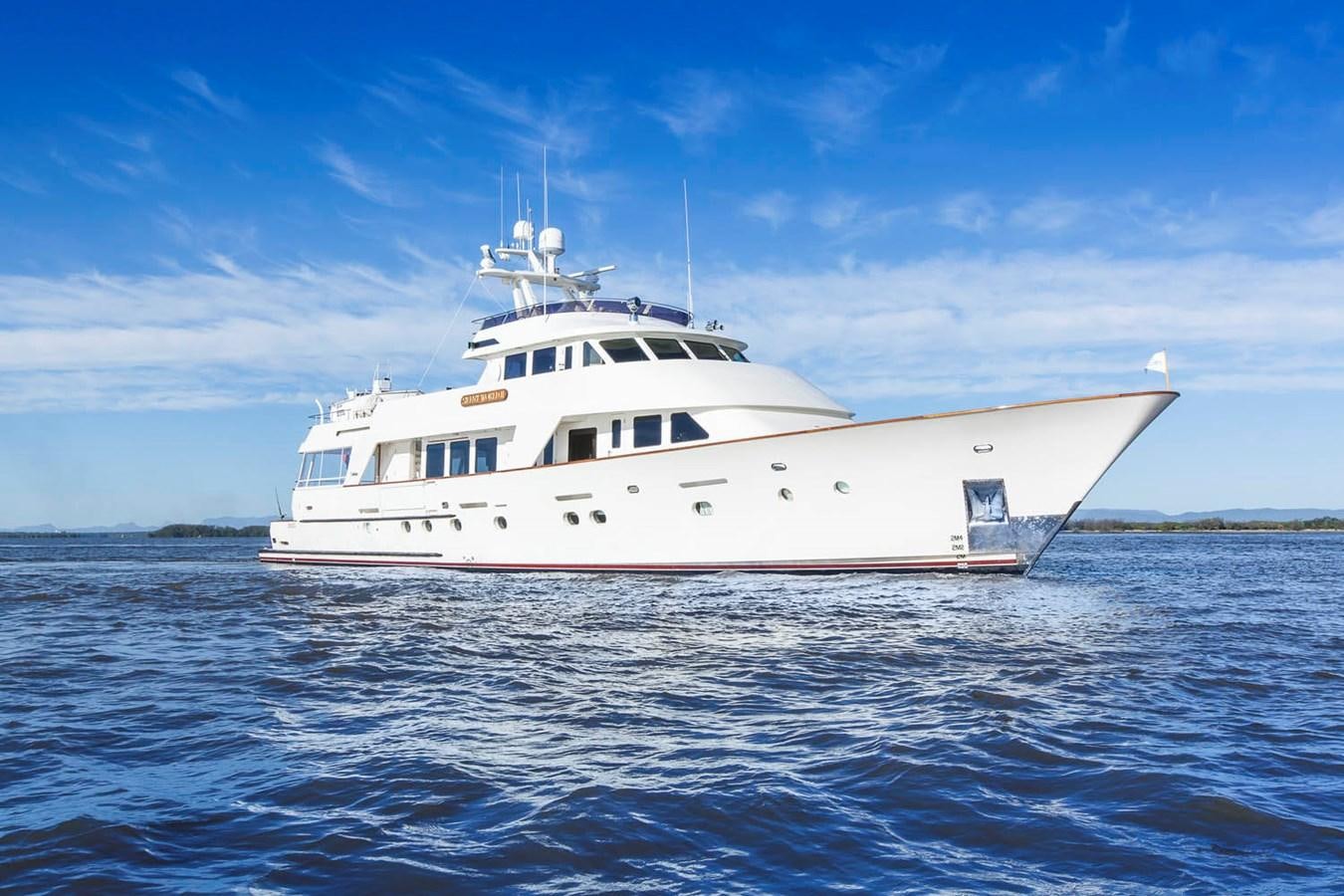 a white boat in the water aboard SILENT WORLD II Yacht for Sale