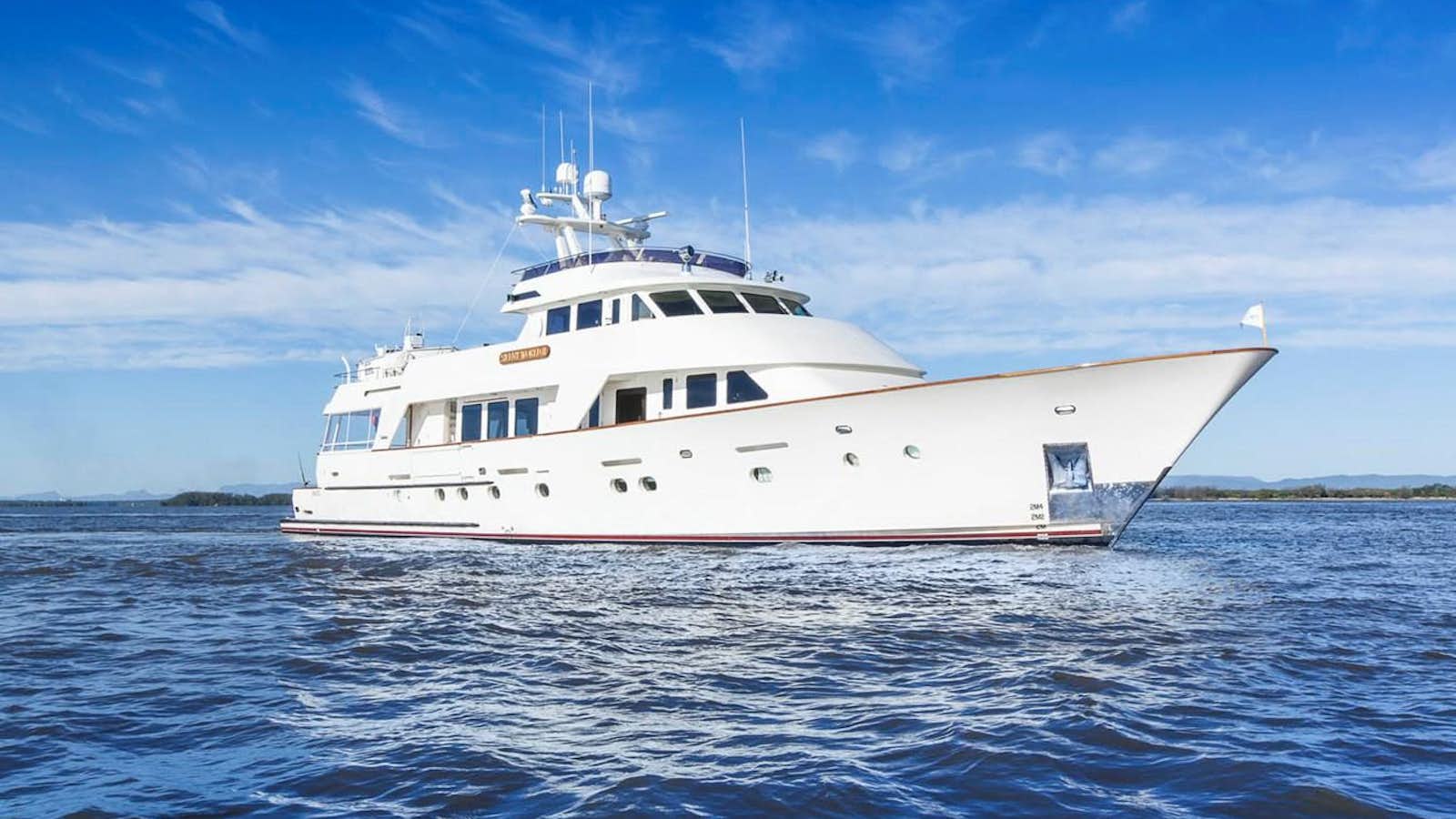 a white boat in the water aboard SILENT WORLD II Yacht for Sale