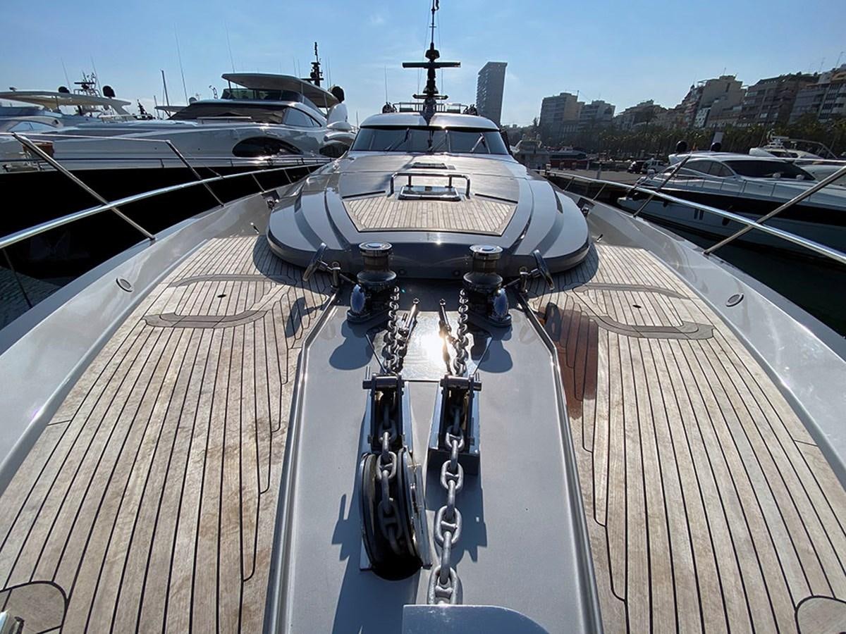 a deck with a deck and a boat on it aboard ESCAPE Yacht for Sale