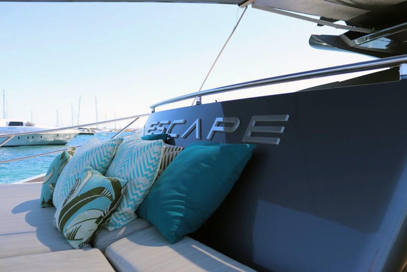 a boat with pillows on the deck aboard ESCAPE Yacht for Sale