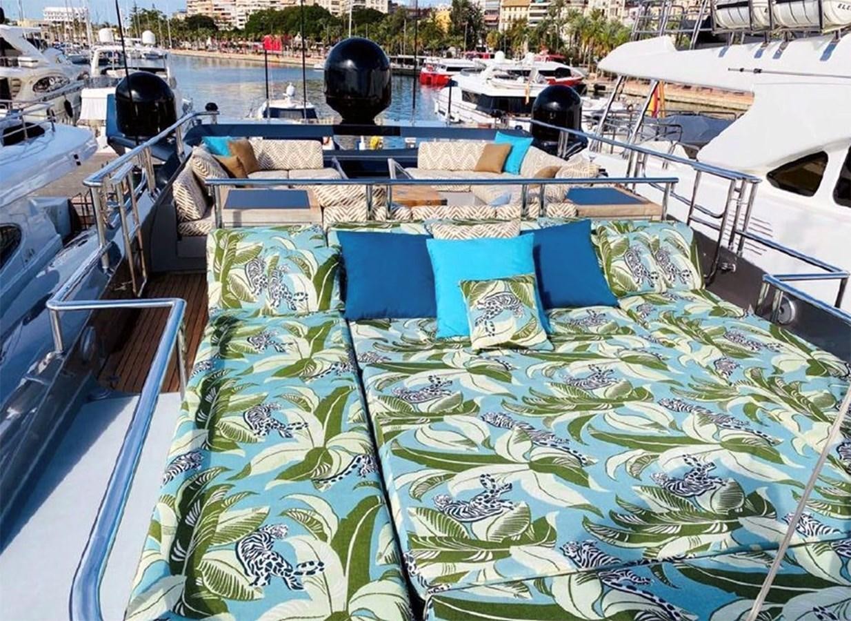 a boat with many blue and white boats aboard ESCAPE Yacht for Sale