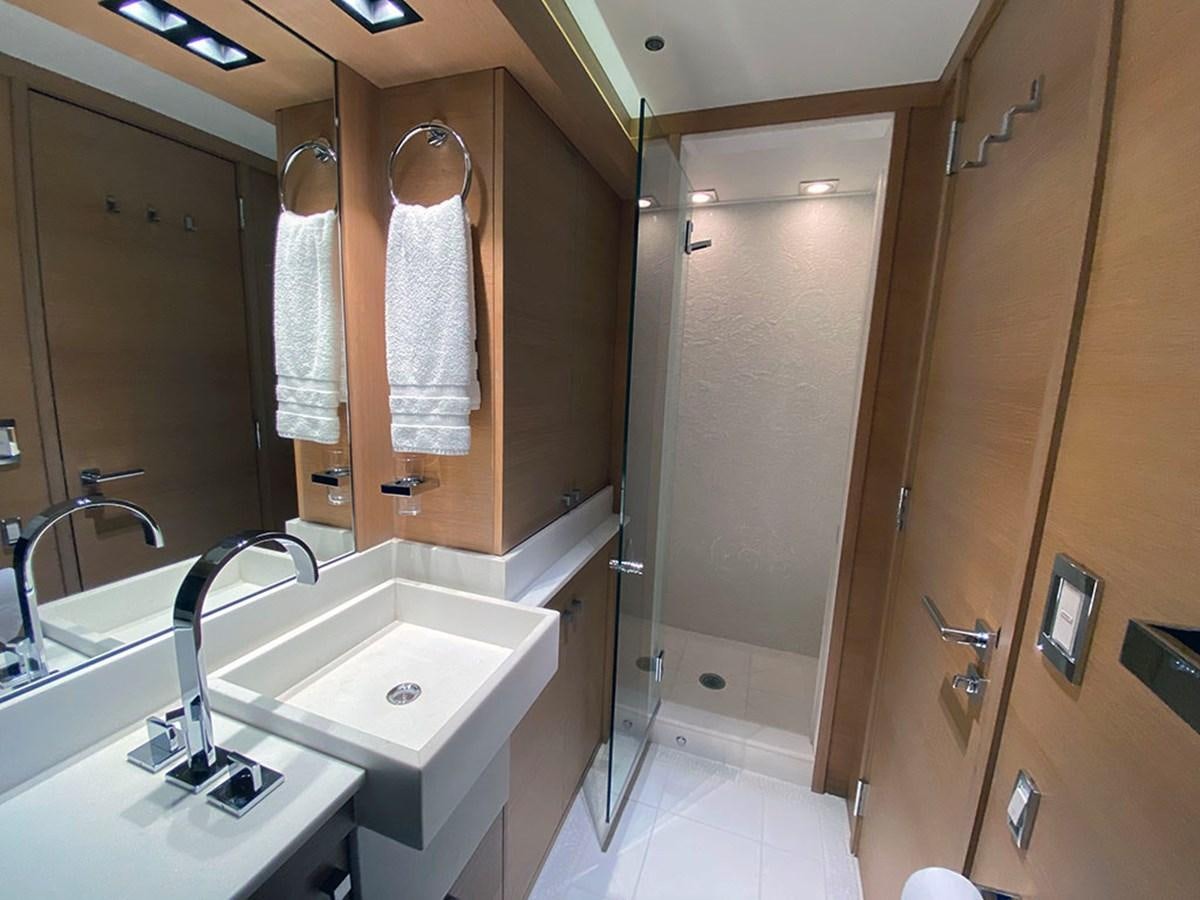 a bathroom with sinks and mirrors aboard ESCAPE Yacht for Sale