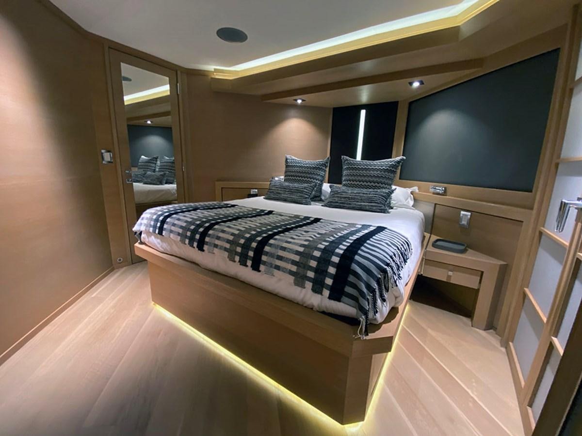 a bed in a room aboard ESCAPE Yacht for Sale