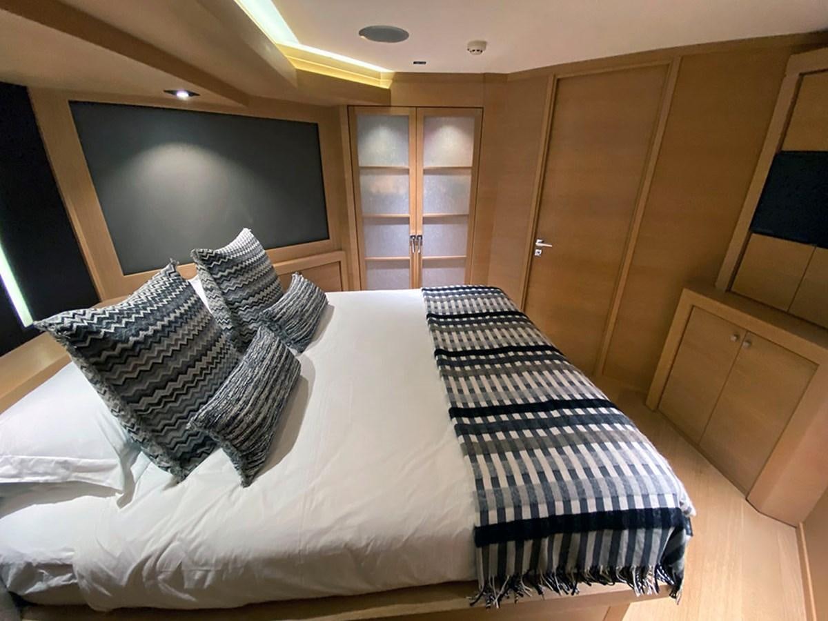 a bed with pillows aboard ESCAPE Yacht for Sale