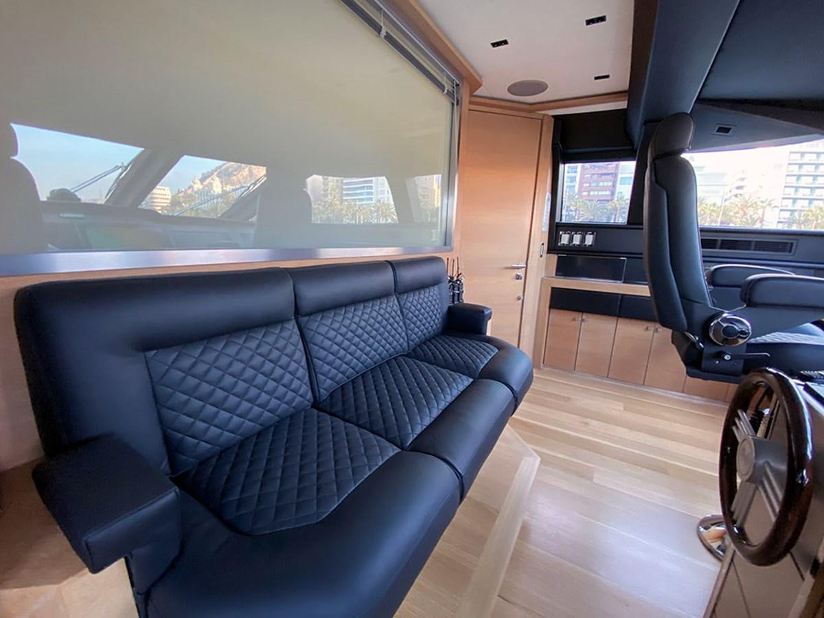 a couch in a bus aboard ESCAPE Yacht for Sale