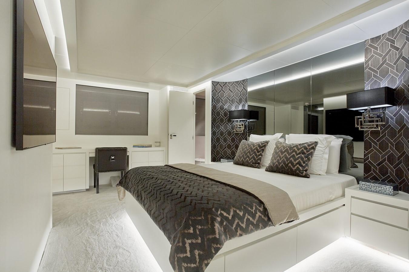 a large bedroom with a large bed aboard EVA Yacht for Sale