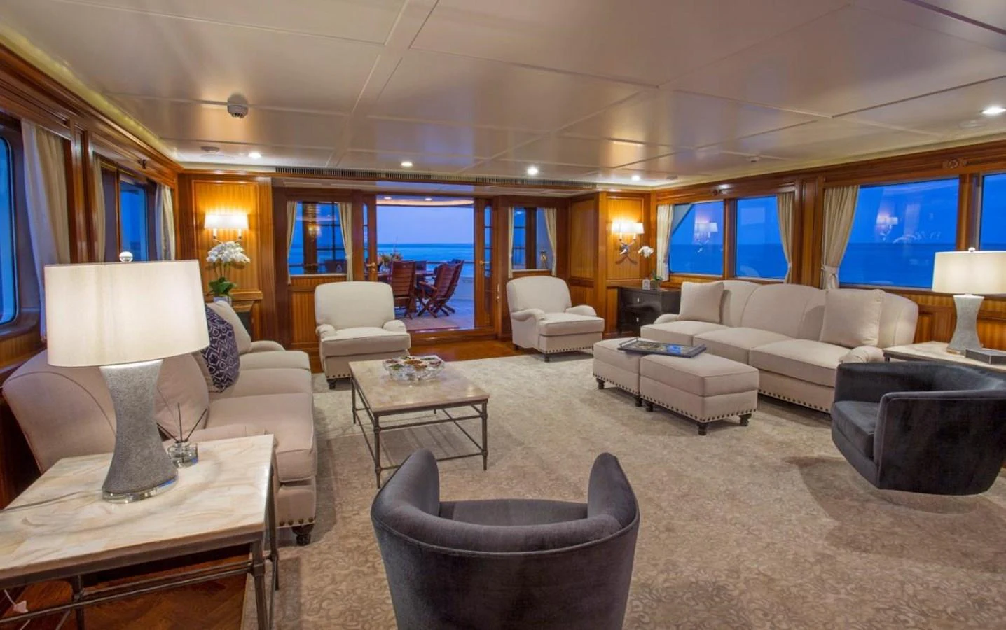 a living room with a large window aboard LADY VICTORIA Yacht for Sale