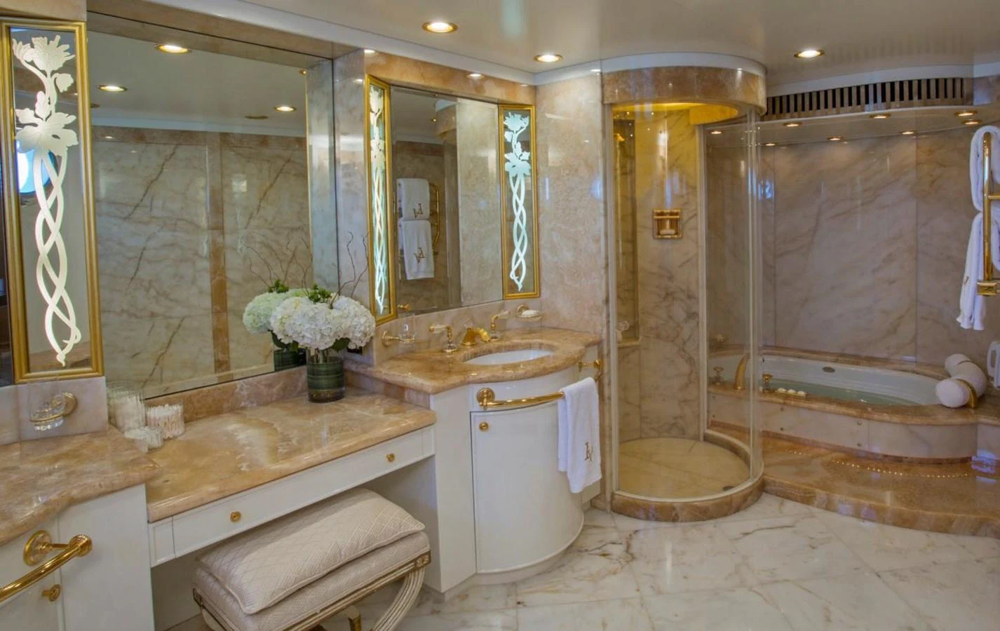 a bathroom with a large mirror aboard LADY VICTORIA Yacht for Sale