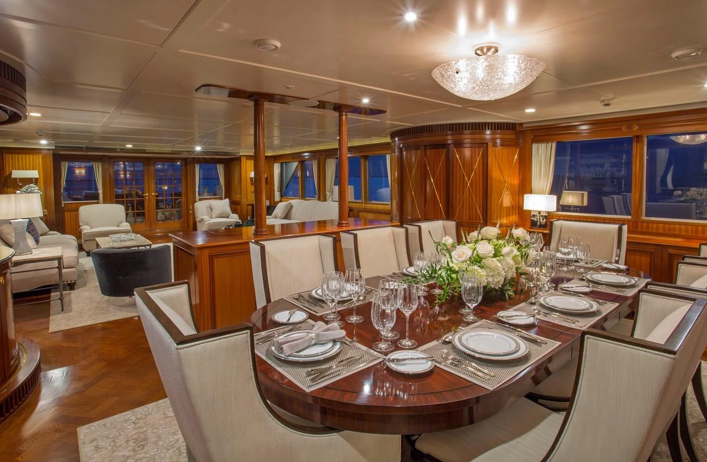 a large room with tables and chairs aboard LADY VICTORIA Yacht for Sale