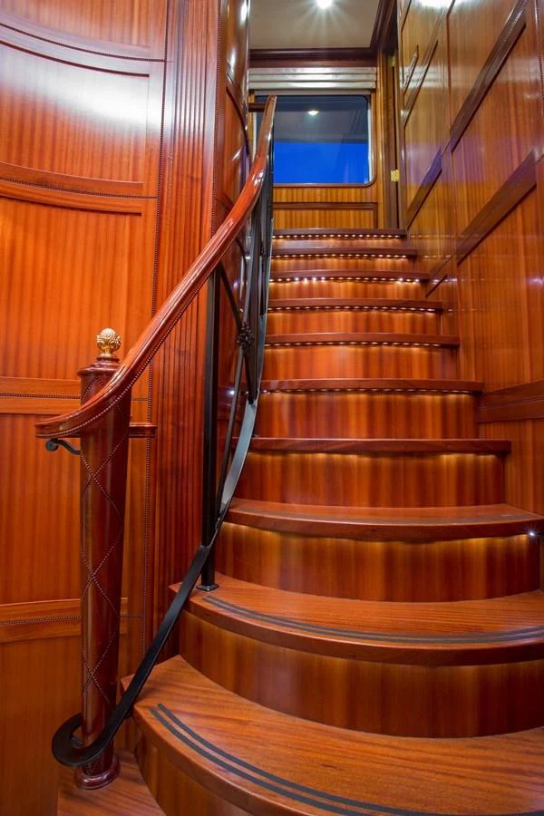 a set of stairs in a building aboard LADY VICTORIA Yacht for Sale