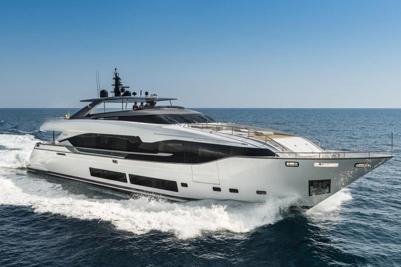 a white yacht on the water aboard HARMONY Yacht for Sale