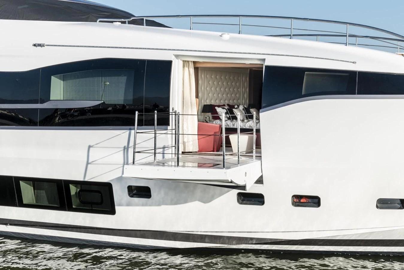 a white boat on the water aboard HARMONY Yacht for Sale