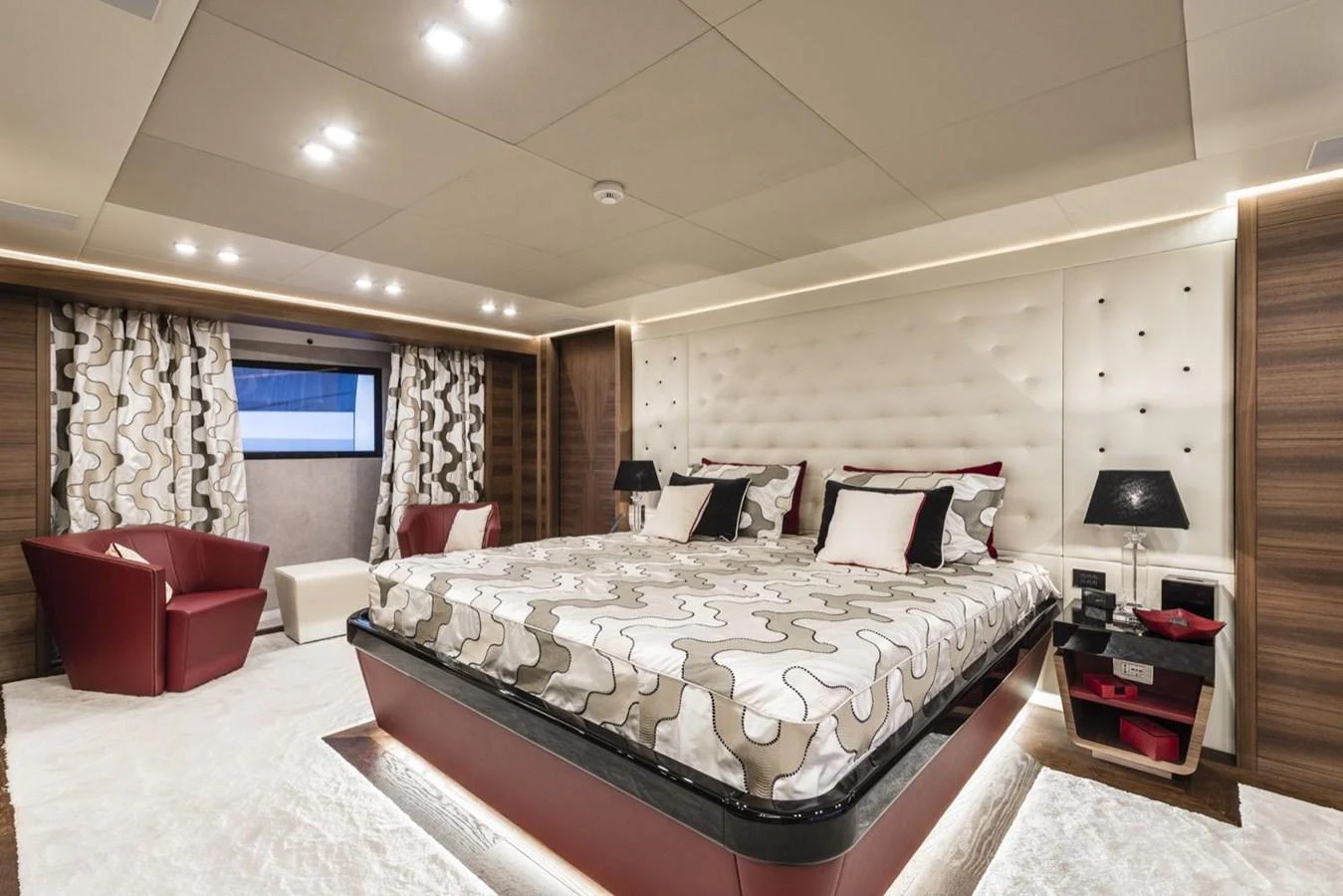 a large bedroom with a large bed aboard HARMONY Yacht for Sale
