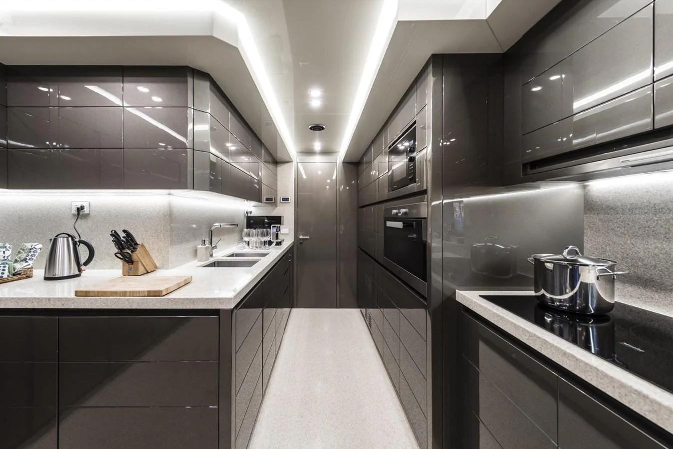 a kitchen with a sink and stove aboard HARMONY Yacht for Sale