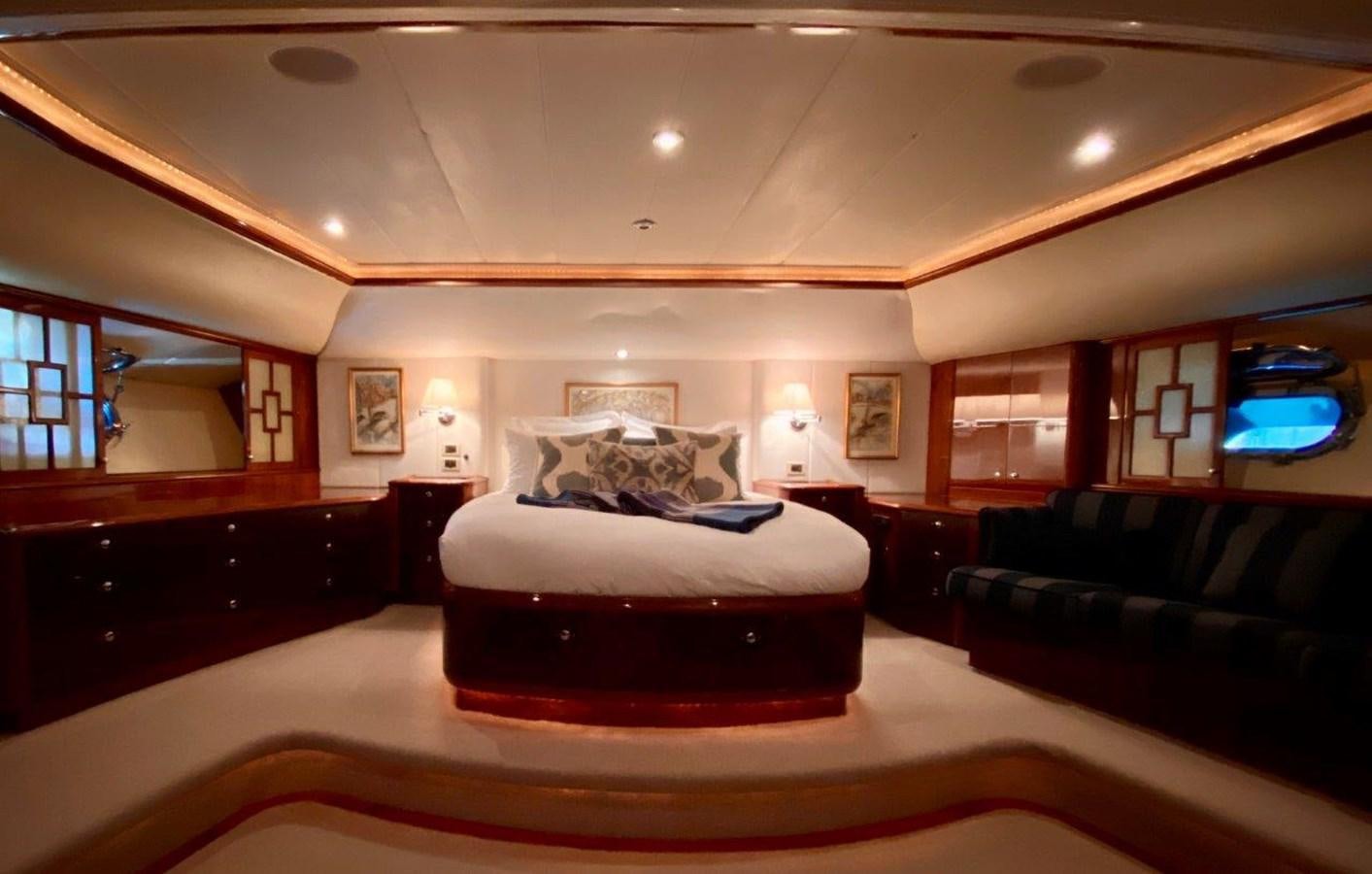 a large bed in a room aboard MISS SILVER Yacht for Sale
