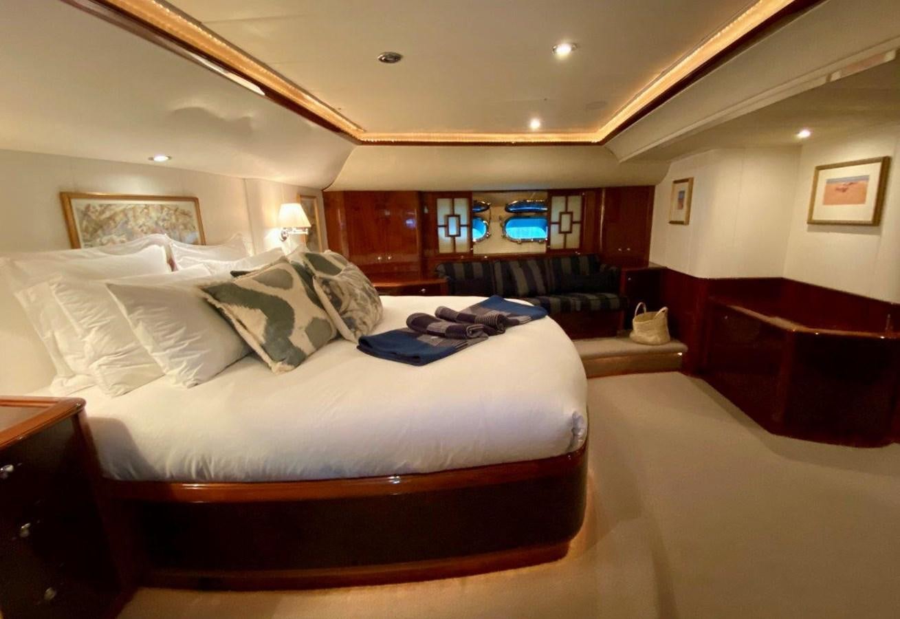 a room with a bed and a couch aboard MISS SILVER Yacht for Sale