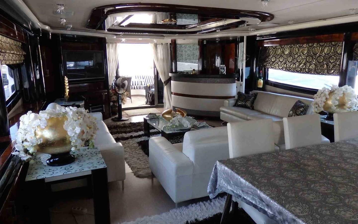 a living room with a piano aboard ETERNITY Yacht for Sale