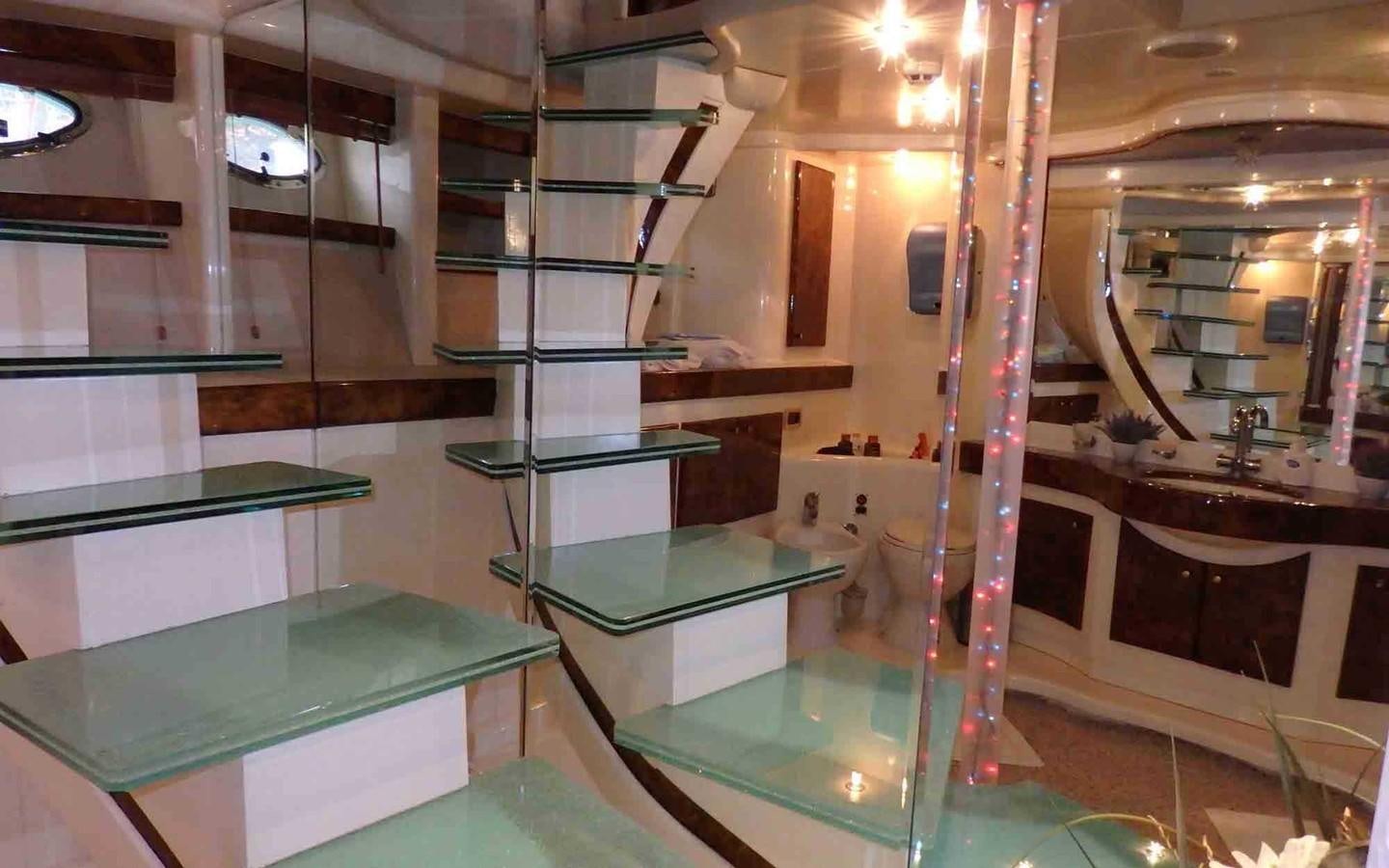 a bathroom with glass walls aboard ETERNITY Yacht for Sale