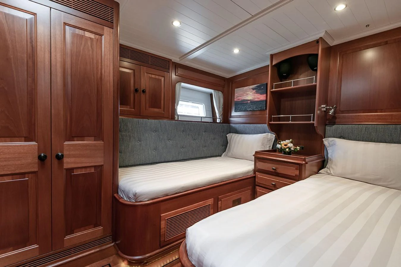 a room with two beds aboard PATH Yacht for Sale