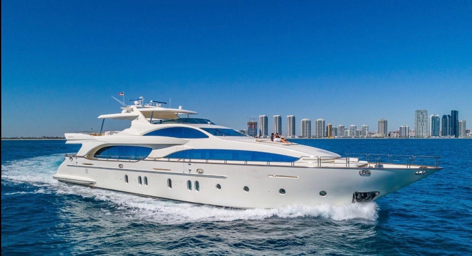 a white yacht on the water aboard AVA Yacht for Sale