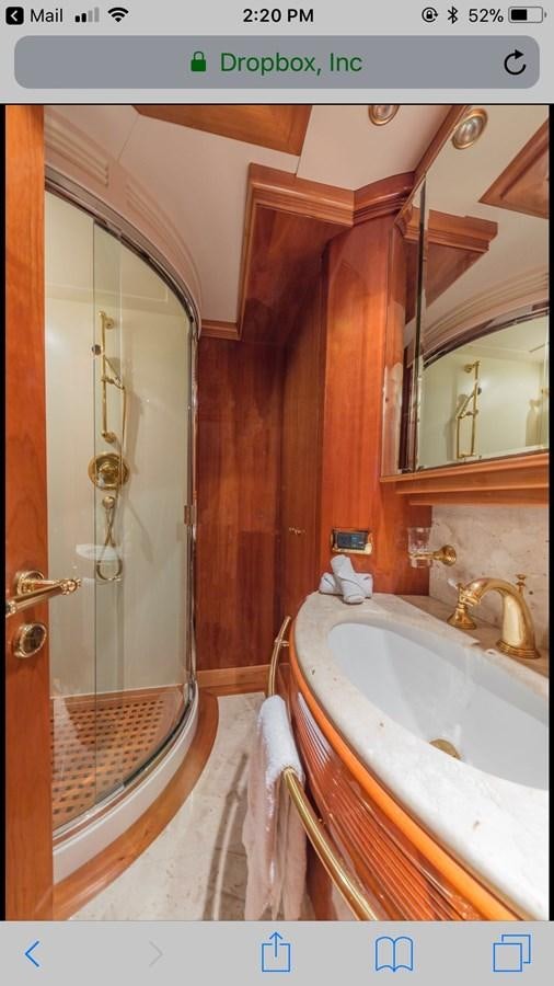 a bathroom with a sink and a mirror aboard AVA Yacht for Sale