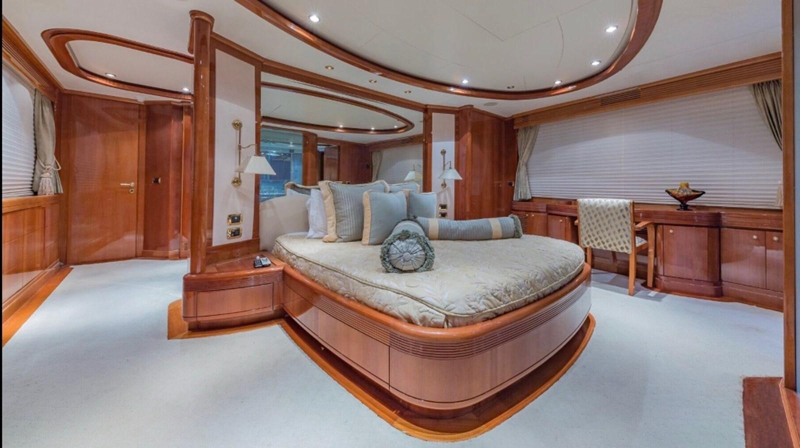 a large bed in a room aboard AVA Yacht for Sale