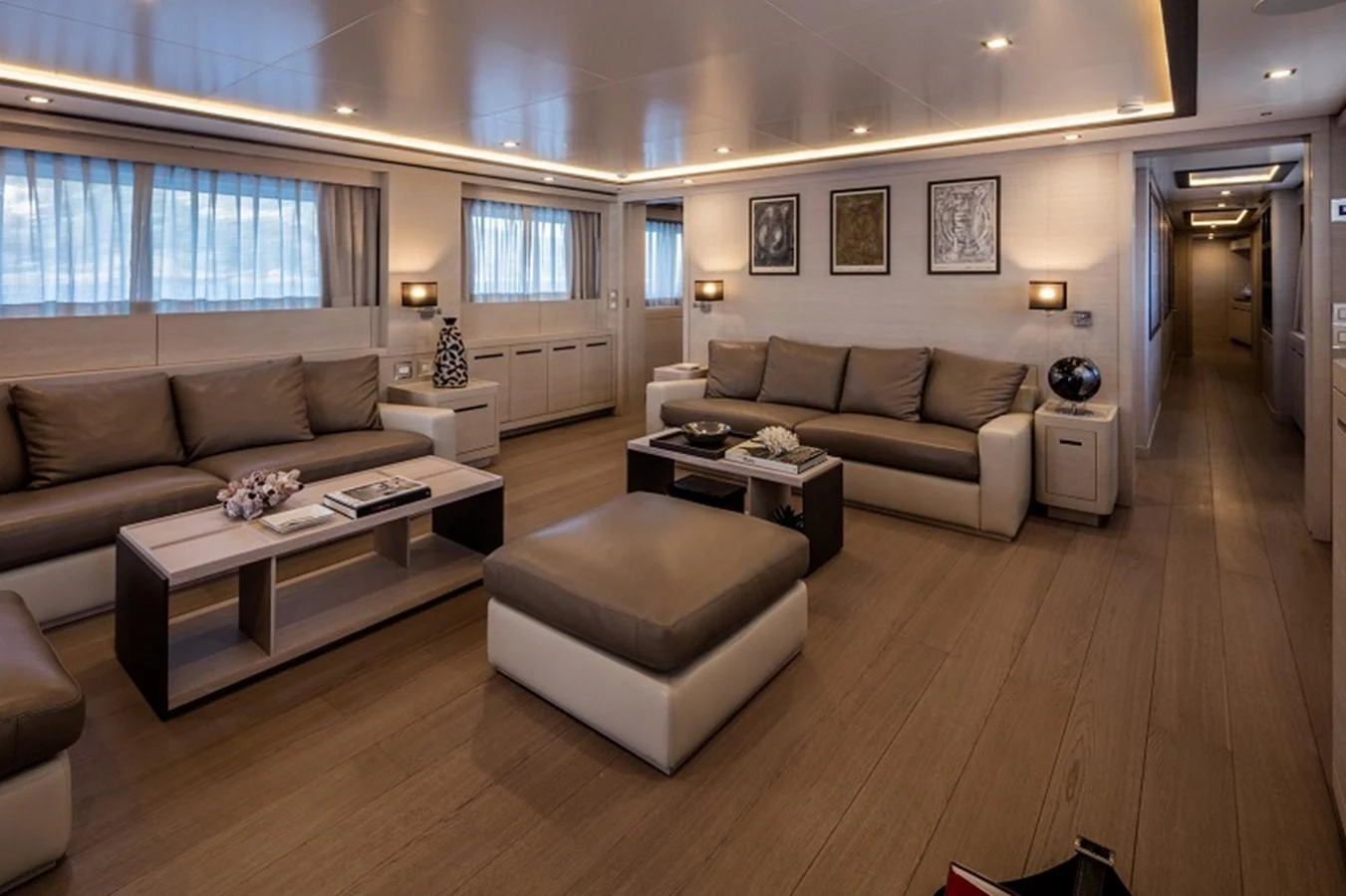 a living room with a couch and a table aboard OTAM SD35 Yacht for Sale