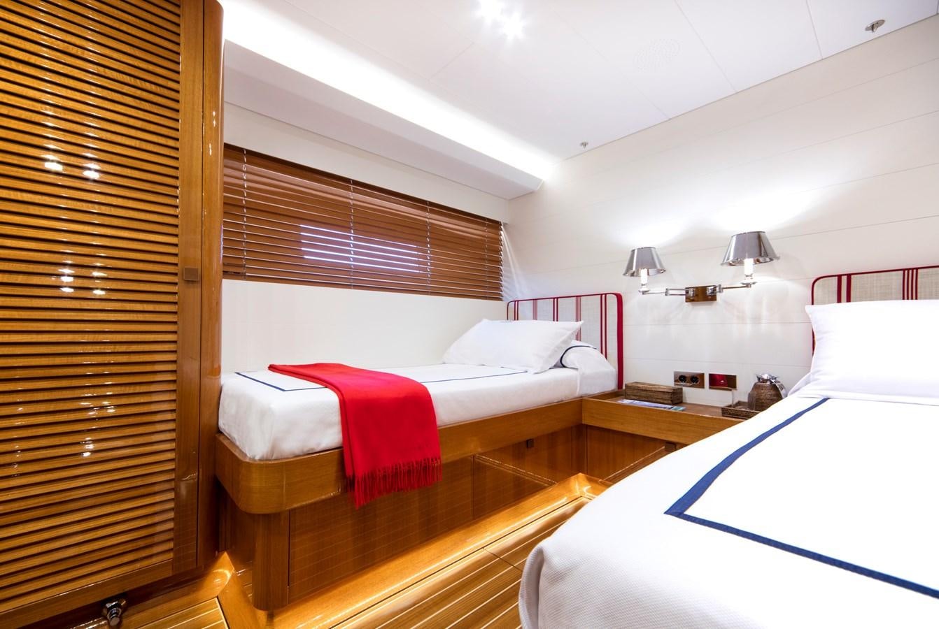 a room with two beds aboard SOLLEONE Yacht for Sale