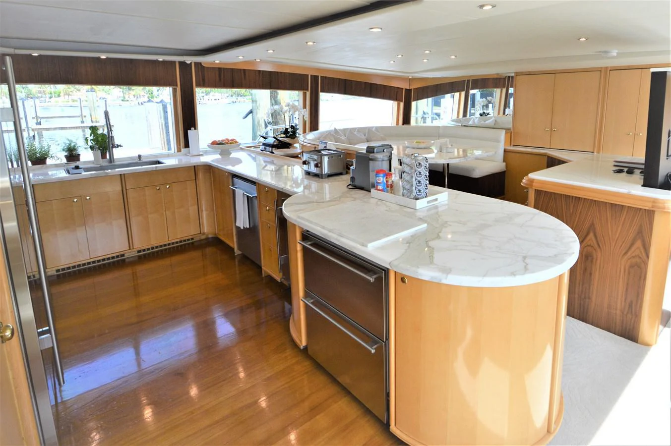 a kitchen with a large island aboard MISS STEPHANIE Yacht for Sale