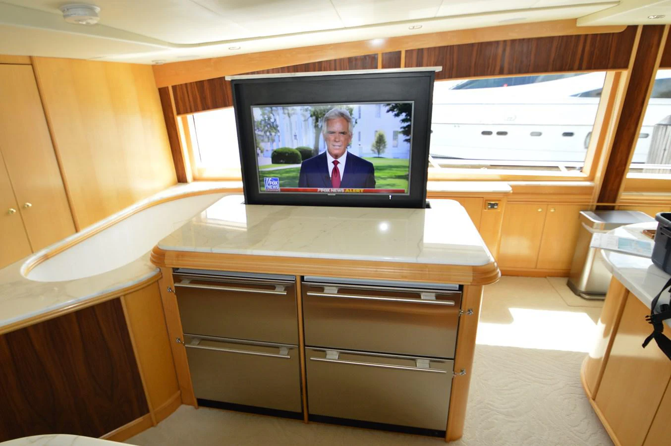 a tv on a desk aboard MISS STEPHANIE Yacht for Sale