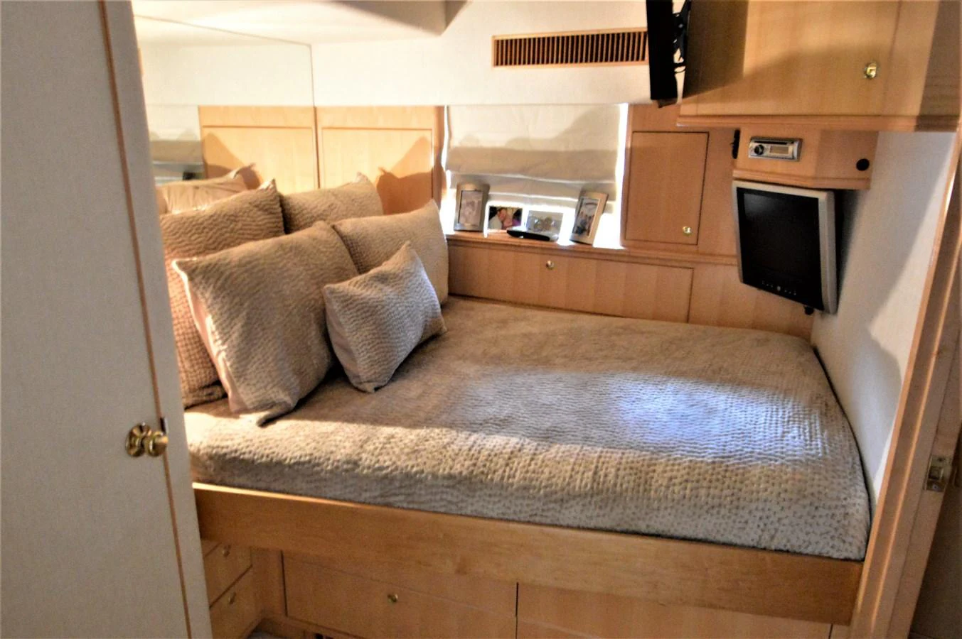 a living room with a bed aboard MISS STEPHANIE Yacht for Sale