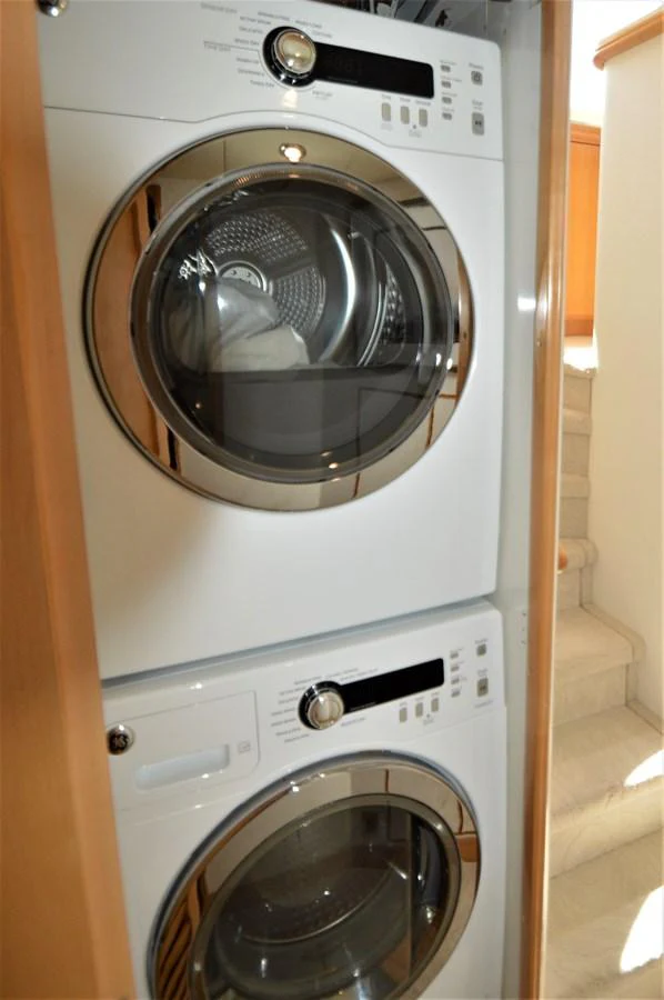 a washing machine in a room aboard MISS STEPHANIE Yacht for Sale