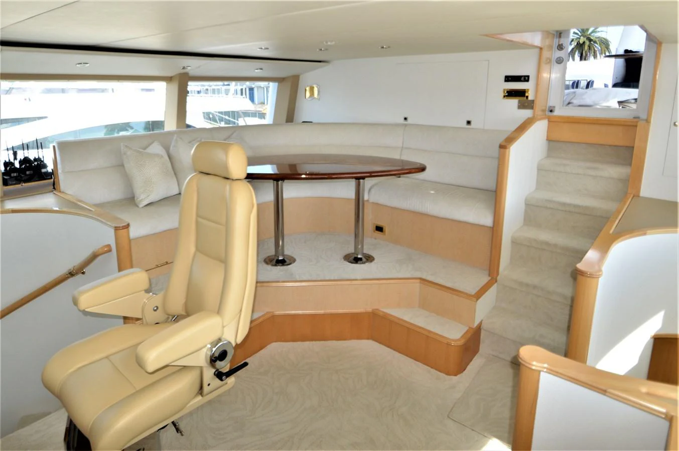 a room with a table and chairs aboard MISS STEPHANIE Yacht for Sale