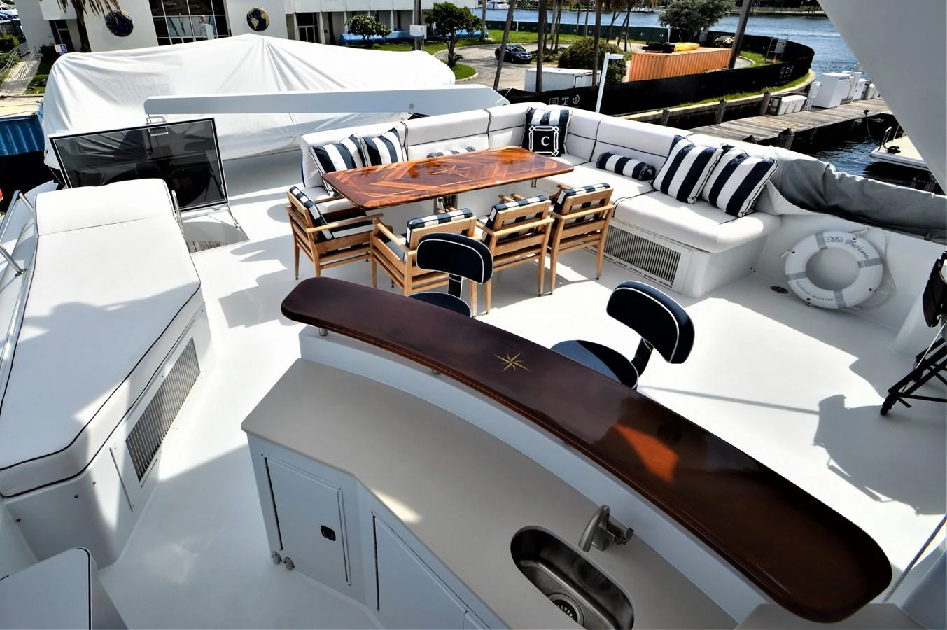 a table and chairs in a room aboard MISS STEPHANIE Yacht for Sale
