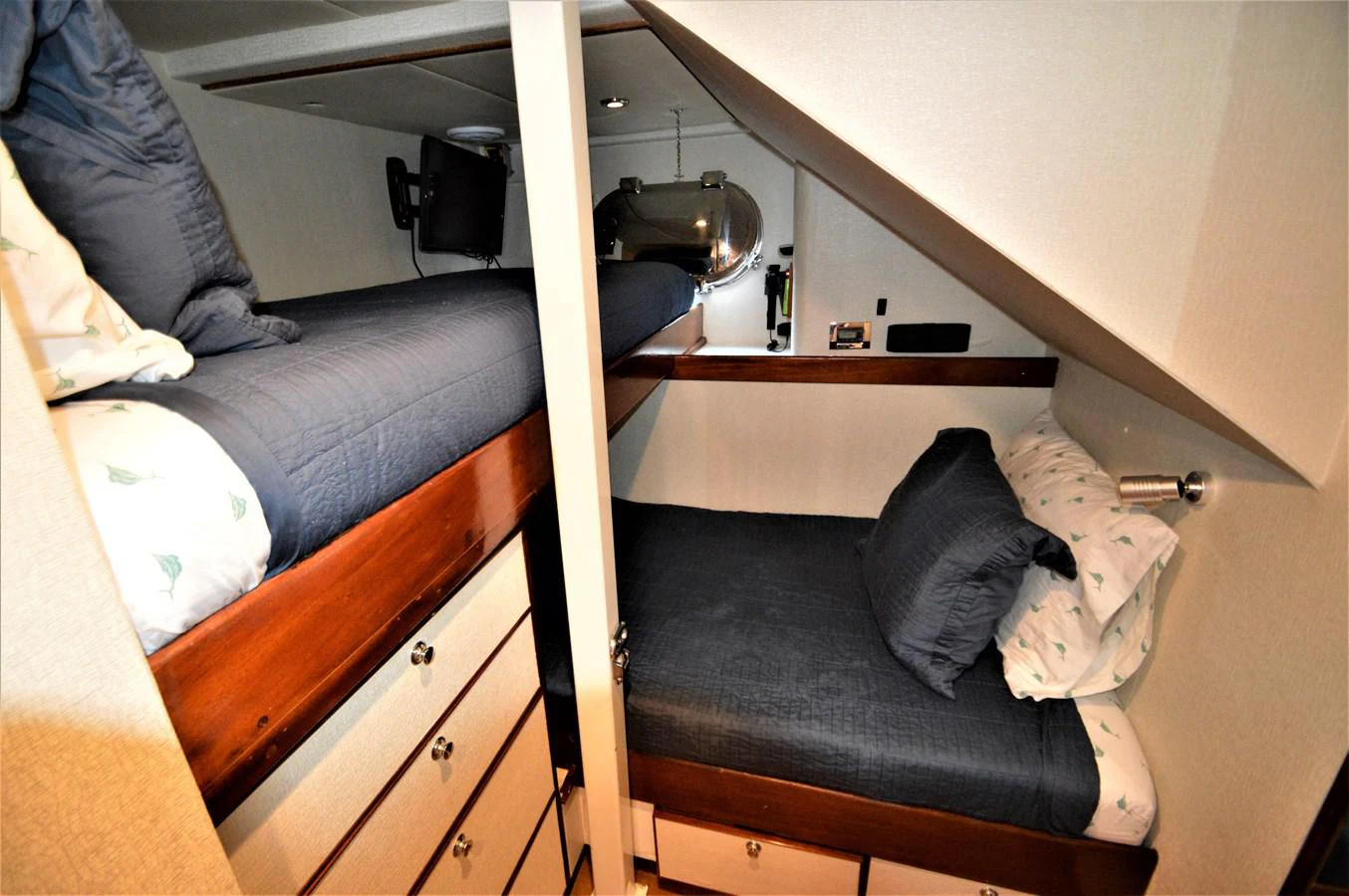 a dog lying on a couch aboard MISS STEPHANIE Yacht for Sale