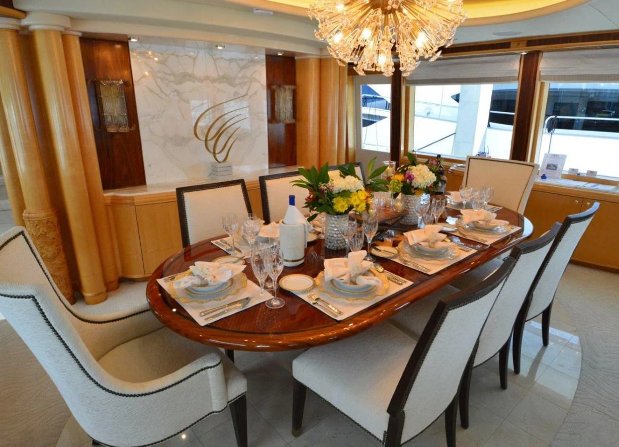 a dining table set for a meal aboard MISS STEPHANIE Yacht for Sale