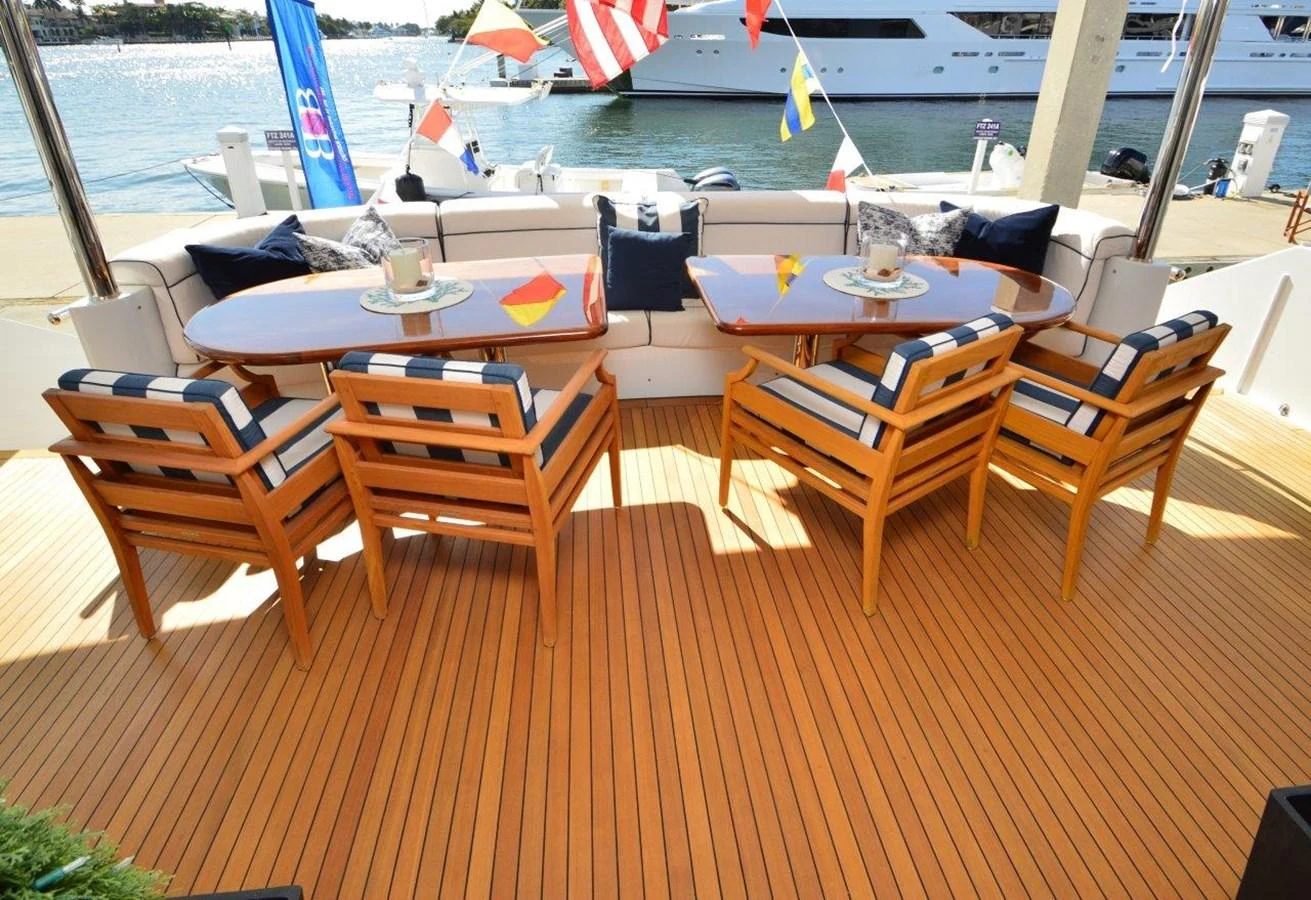 a group of chairs on a deck aboard MISS STEPHANIE Yacht for Sale
