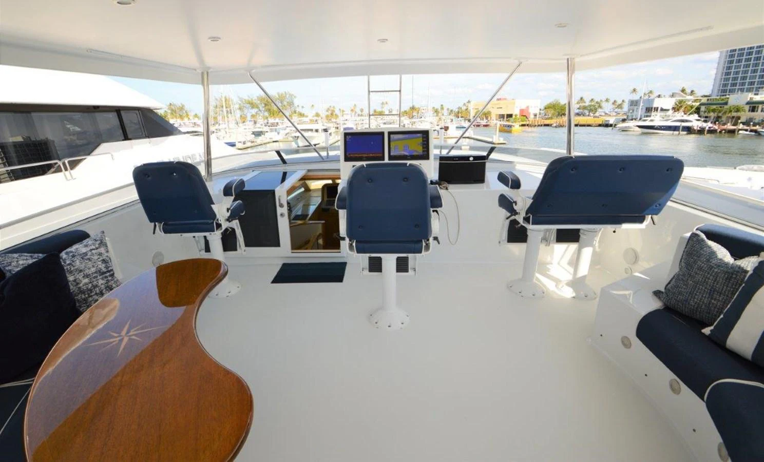a room with a table and chairs aboard MISS STEPHANIE Yacht for Sale