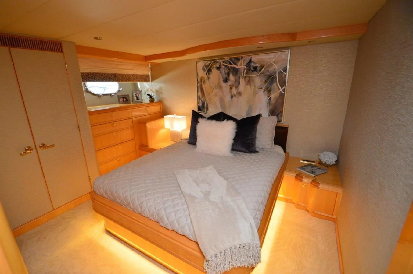 a bed in a room aboard MISS STEPHANIE Yacht for Sale