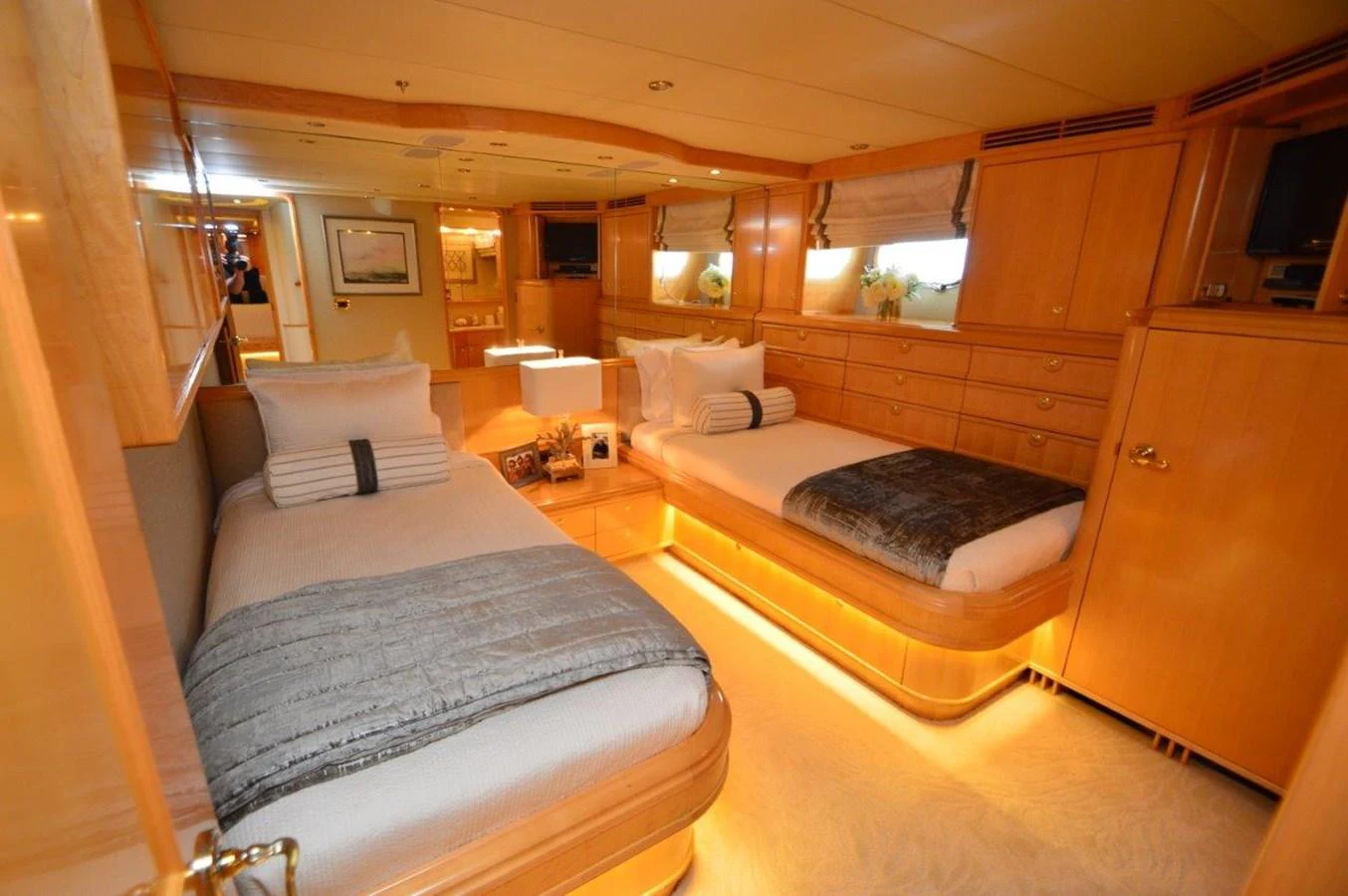 a room with a bed and a chair aboard MISS STEPHANIE Yacht for Sale
