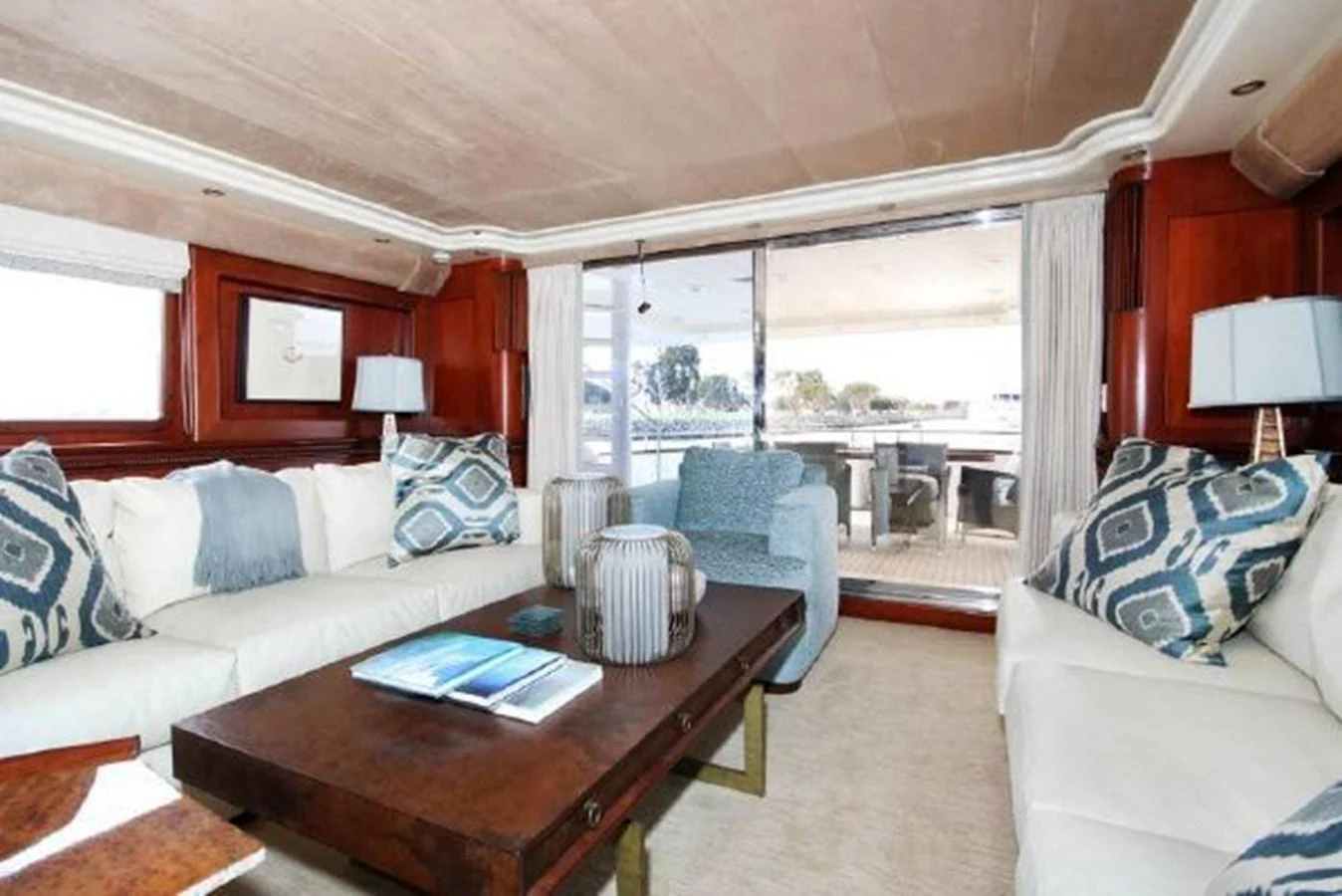 a living room with a large window aboard AMADEUS Yacht for Sale